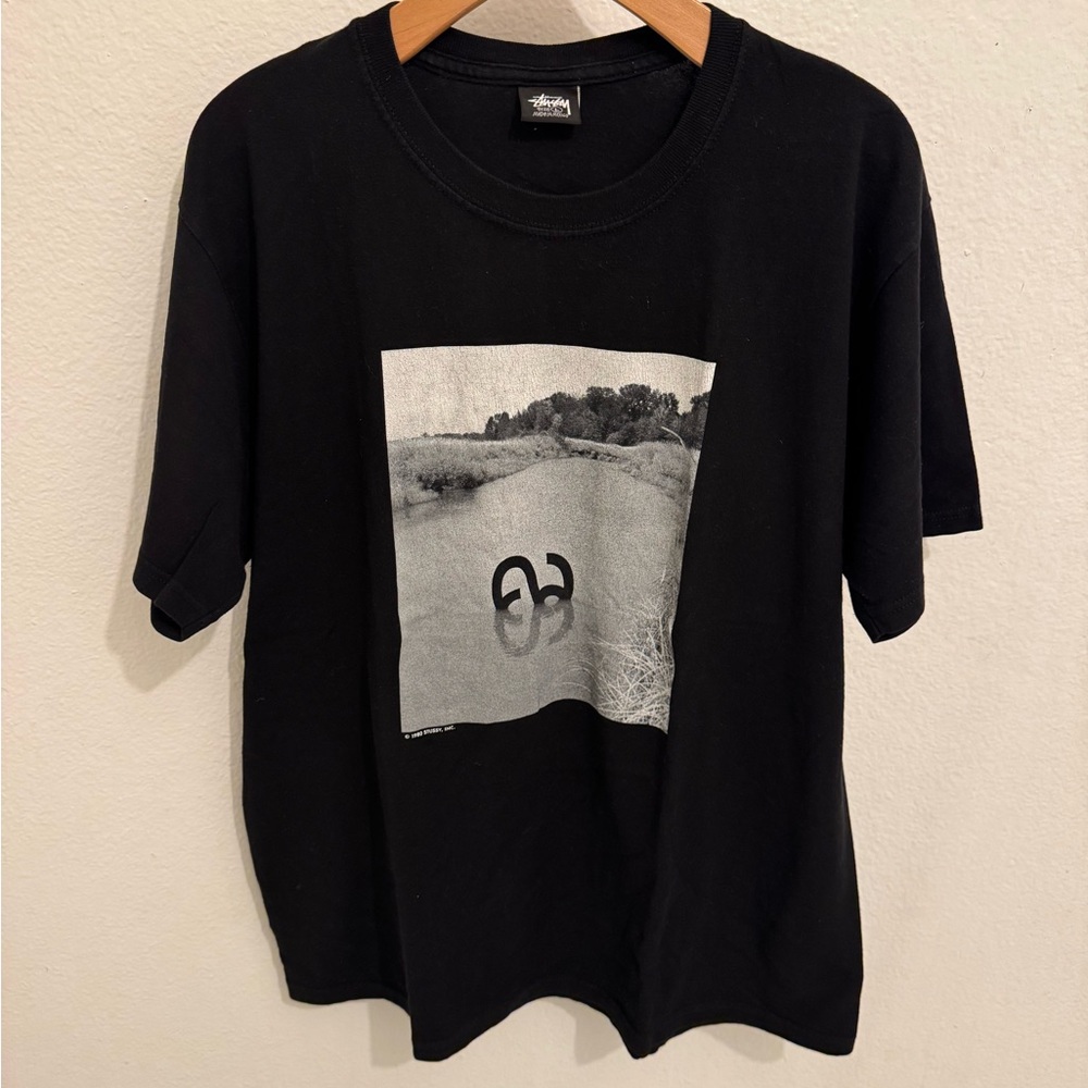 Stussy short sleeved men’s graphic crewneck pullover shirt. Size large